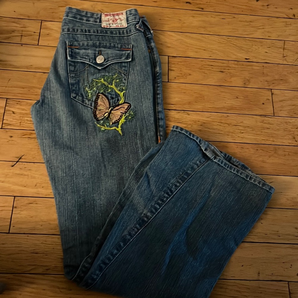 True Religion bootcut jeans with butterfly pocket embellishment